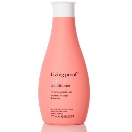 Peach-colored bottle of Living Proof Curl Conditioner, 12 oz, featuring a white cap and labeled for waves, curls, and coils, with a sleek, modern design.