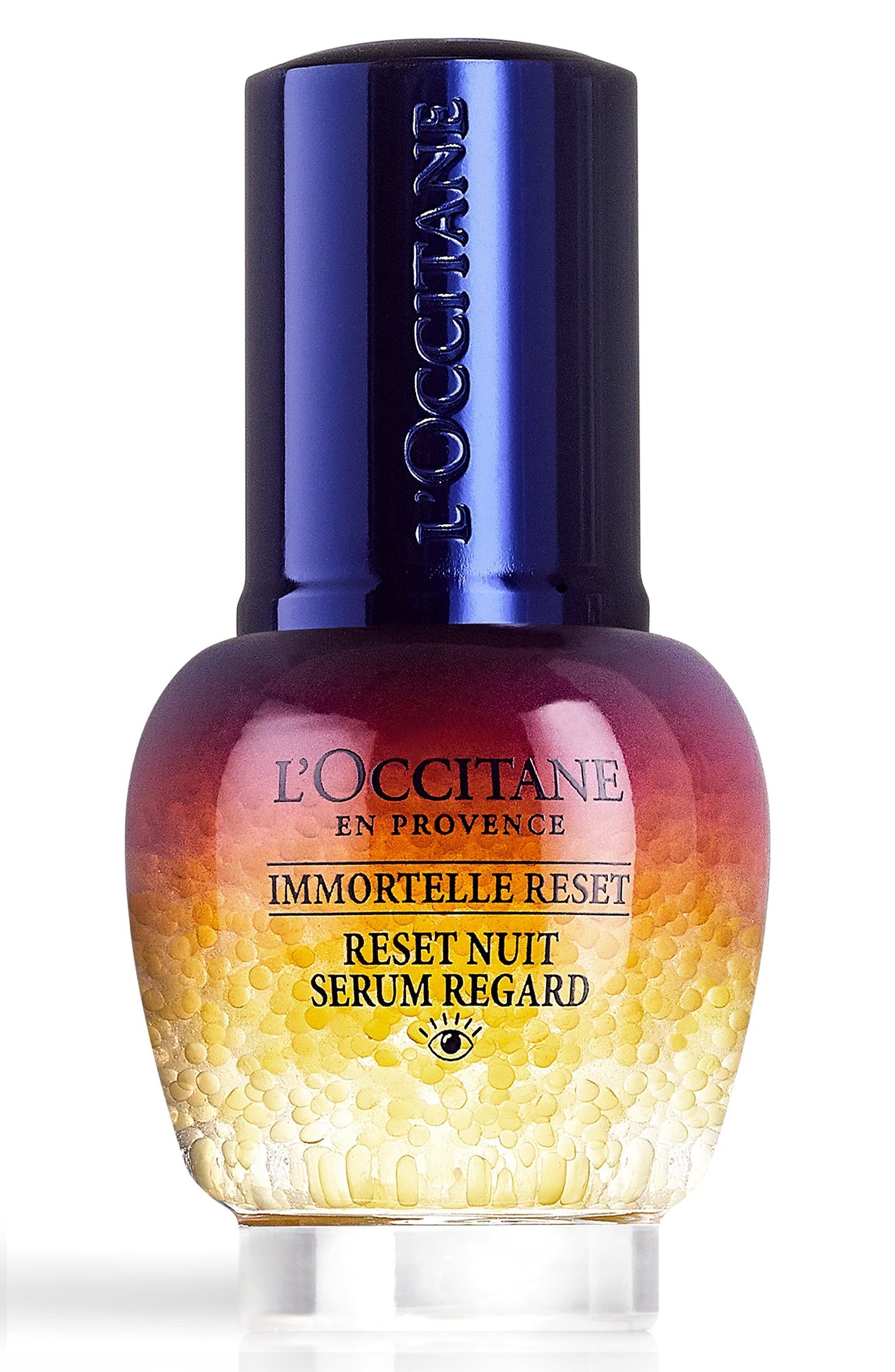 L'Occitane Immortelle Reset Night Serum in a glass bottle with a gradient from deep purple to golden yellow, featuring a sleek black cap and embossed branding on the front.