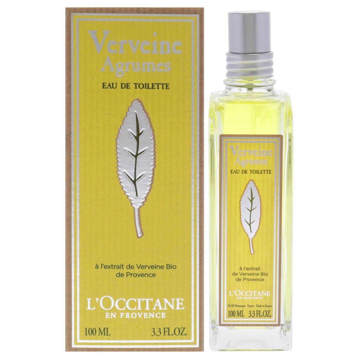 Clear glass bottle with a silver leaf design, filled with light yellow liquid, beside a yellow and silver box labeled "Verveine Agrumes" and "L'Occitane," 3.3 fl oz.
