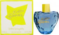Light blue glass bottle in a heart shape with a gold cap, accompanied by a bright yellow box featuring the brand name in elegant script.