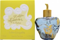 Clear glass bottle shaped like an apple with a gold cap, adorned with whimsical designs, next to a bright yellow box featuring elegant white swirls and the product name.