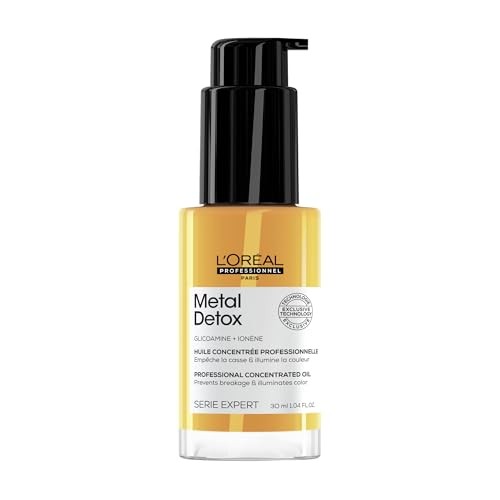 L'Oréal Professionnel Metal Detox Anti-Breakage Hair Oil in a clear glass bottle with a black pump, featuring a yellow liquid and white label, 1.04 Fl Oz/30 Ml.