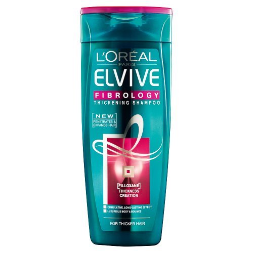Turquoise bottle of L'Oreal Elvive Fibrology Thickening Shampoo, 400ml, featuring a pink cap and vibrant pink label with white text and a decorative swirl design.