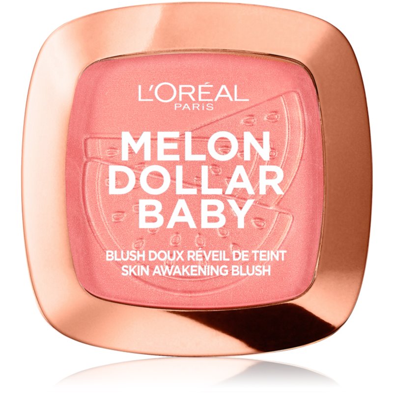 Compact powder blush in a soft pink shade with a watermelon design, featuring a rose gold case, mirror, and brush included, scented for a refreshing touch.