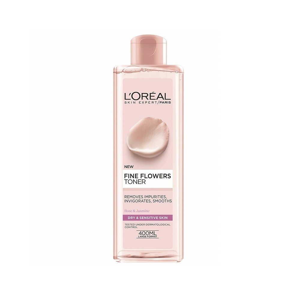 L'Oreal Paris Fine Flowers Cleansing Toner in a transparent pink bottle, featuring a soft floral design, labeled for dry and sensitive skin, with a 400ml capacity.
