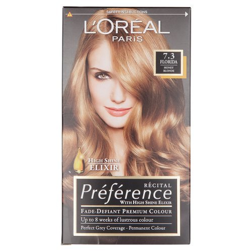 L'Oreal Paris Recital Preference hair color box in Florida Honey Blonde (7.3), featuring a model with flowing hair, gold accents, and claims of fade-defiant, high shine, and perfect grey coverage.