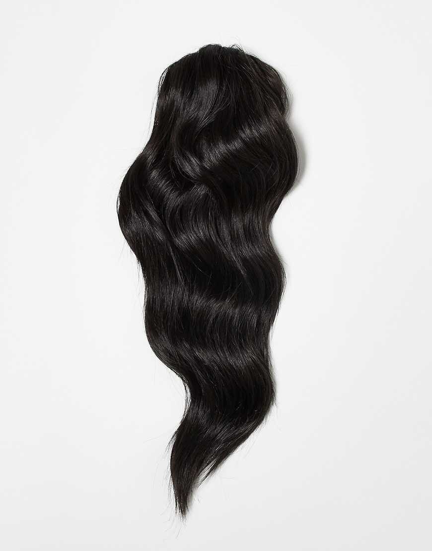 Brushed out wave claw clip ponytail in California Blonde, featuring soft, wavy synthetic hair with a natural sheen, designed for easy attachment and stylish versatility.