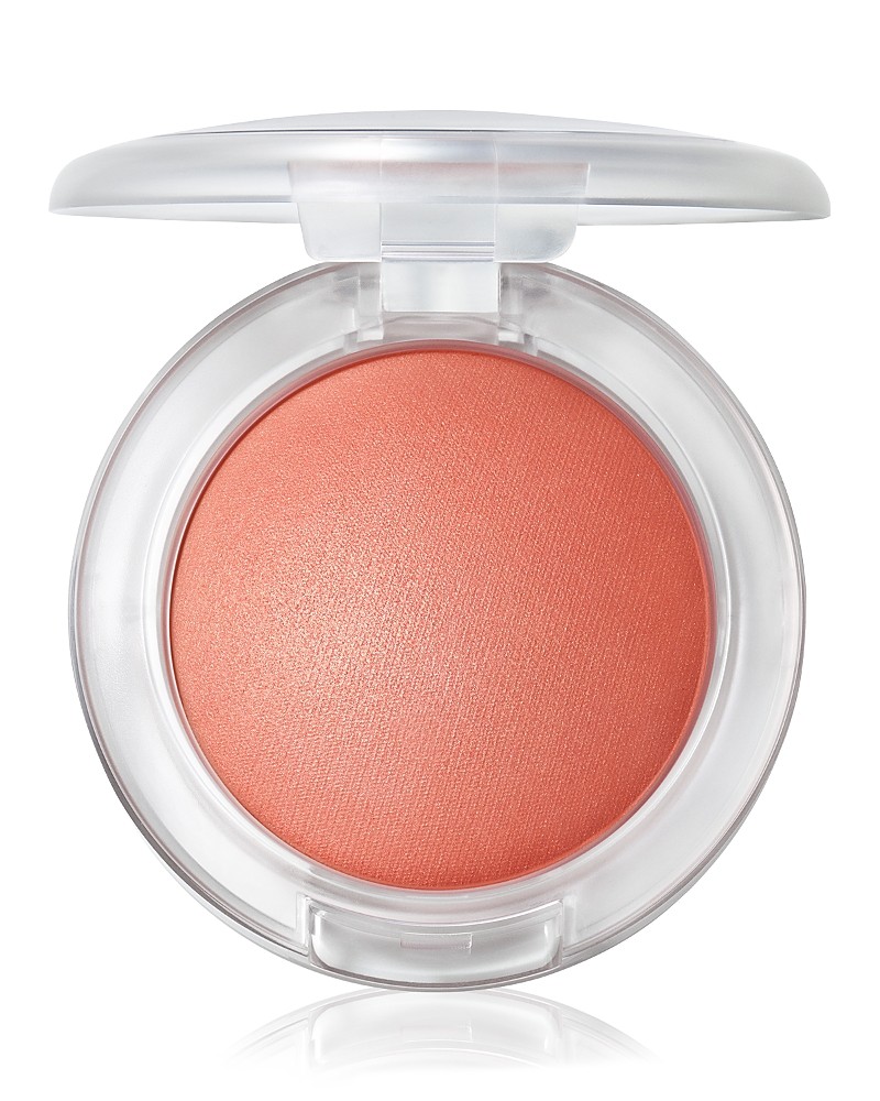 Round compact containing a peachy coral blush with a soft, shimmery finish, encased in a clear plastic lid for easy visibility.