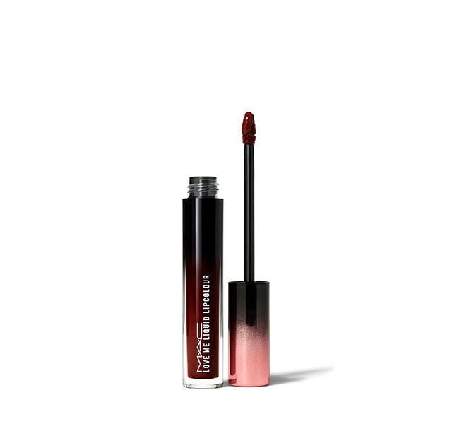 MAC Love Me Liquid Lipcolour in a sleek black and pink gradient tube, featuring a doe-foot applicator and a rich, vibrant pink shade.