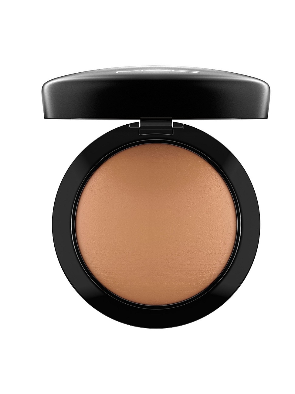 Round compact containing a smooth, matte dark brown face powder, encased in a sleek black casing with a reflective lid.