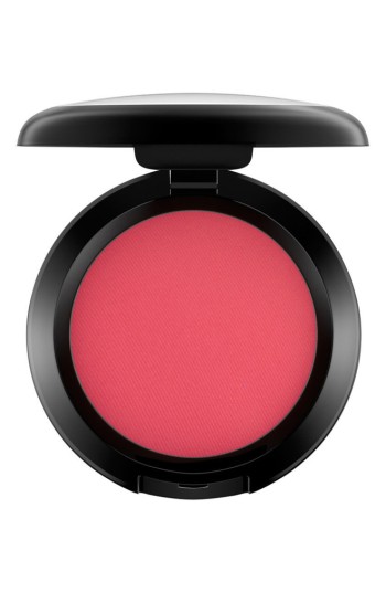Bright pink powder blush in a sleek black compact with a smooth finish, featuring a round pan and a secure lid, labeled "Frankly Scarlet" by MAC Cosmetics.