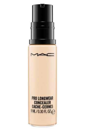 Beige liquid concealer in a sleek, transparent bottle with a black pump top, featuring the MAC logo and product name in bold black text.