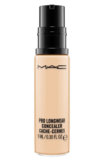 Beige concealer in a sleek, clear glass bottle with a black pump top, labeled "MAC Pro Longwear Concealer NC20 9 ML" for full coverage and matte finish.