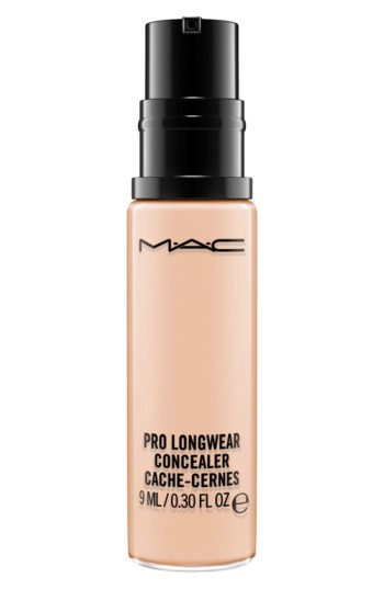 MAC Pro Longwear Concealer in NW20, featuring a sleek glass bottle with a black pump top, displaying a light beige liquid inside, labeled with product details in black text.