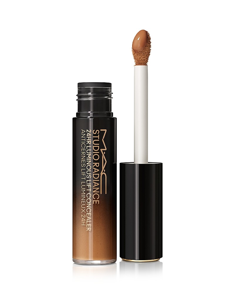 MAC Studio Radiance 24HR Luminous Lift Concealer in NC47 features a sleek black tube with a white applicator wand, showcasing a rich, warm brown shade.