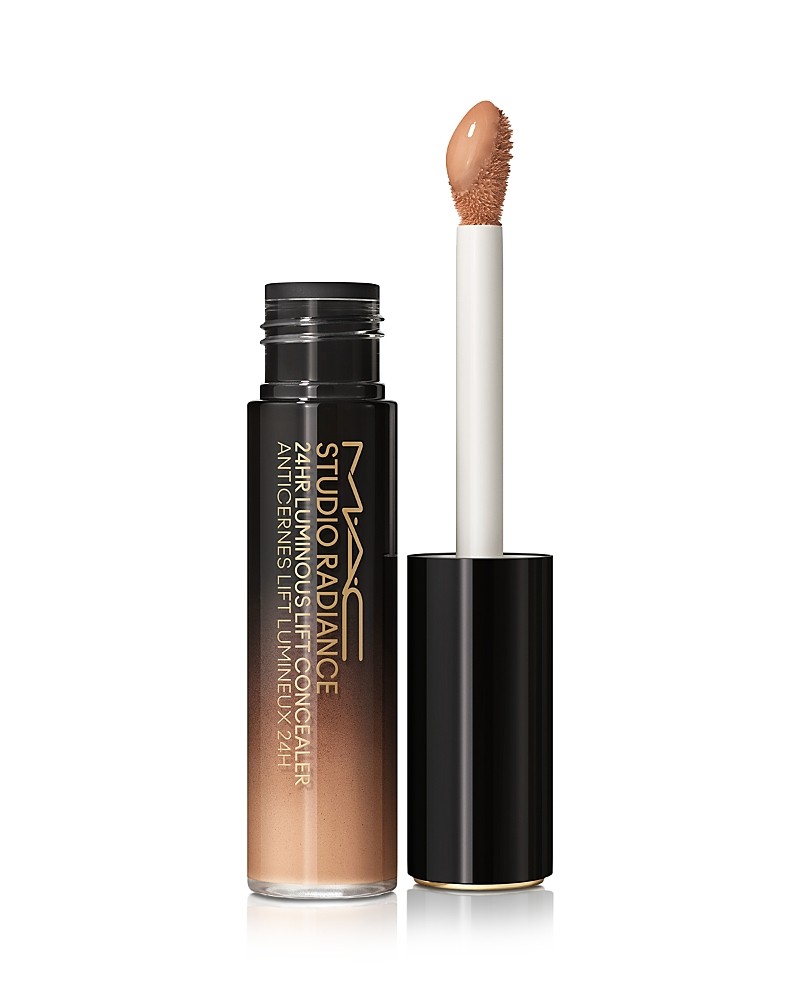 MAC Studio Radiance 24HR Luminous Lift Concealer features a sleek black tube with gold lettering, a soft applicator wand, and a light beige shade for a radiant finish.