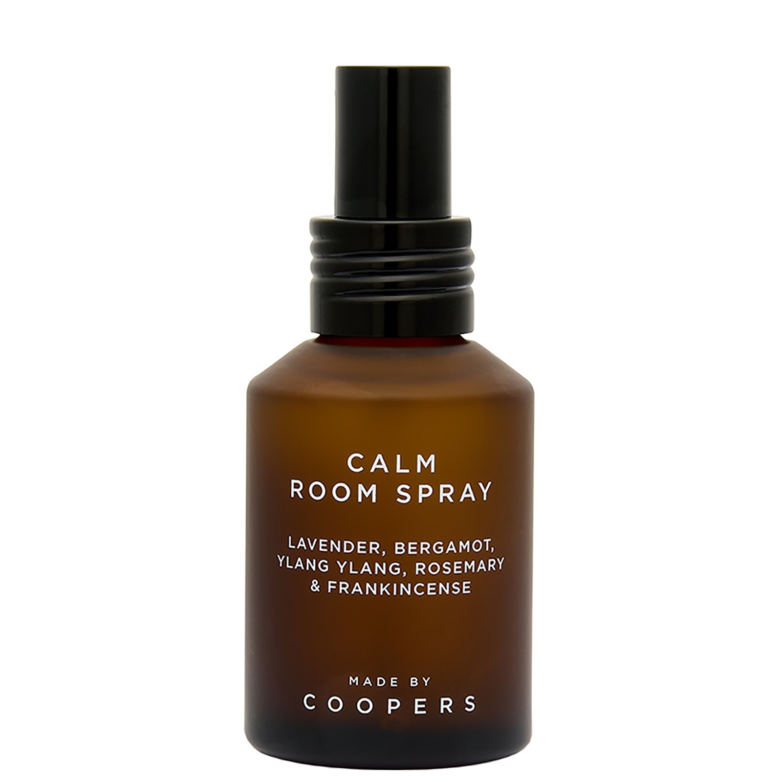 Amber glass spray bottle with a black pump top, labeled "CALM ROOM SPRAY" featuring calming ingredients like lavender and frankincense, designed for both men and women.