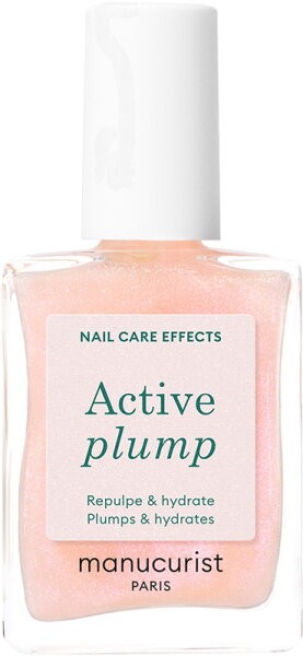 Transparent glass bottle with a white cap, containing a light pink, shimmery nail product labeled "Active Plump" by Manucurist, emphasizing hydration and plumping effects.