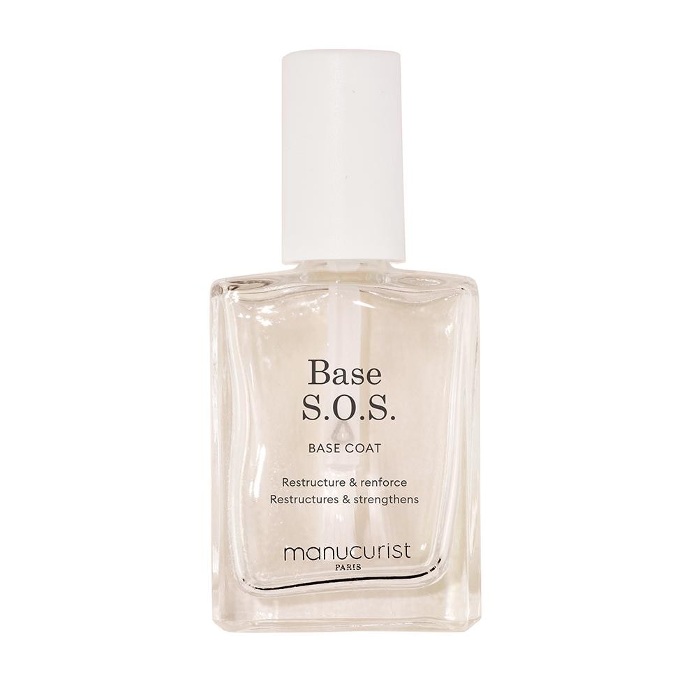Clear glass bottle containing 15ml of Base S.O.S nail polish, featuring a white label with black text and a simple, elegant design, topped with a white cap.