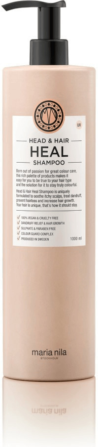 Light pink bottle with a black pump, labeled "Head & Hair Heal Shampoo" featuring aloe vera extract, 1000 ml, cruelty-free, and produced in Sweden.