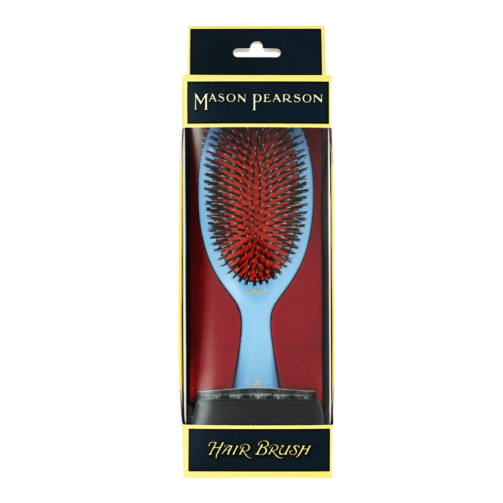 Medium bristle and nylon hair brush with a blue handle and red bristles, packaged in a black and gold box labeled "Mason Pearson Hair Brush."