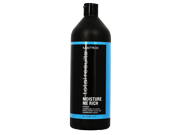 Black bottle with a matte finish, featuring a blue label that reads "Moisture Me Rich Glycerin Conditioner," 1000ml/33.8oz size, designed for hydration.