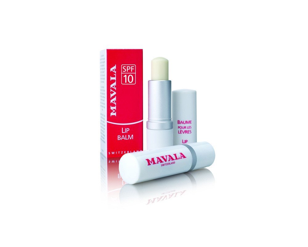 Mavala Lip Balm in a white tube with a silver band, featuring a light-colored balm stick, packaged in a red and white box labeled "SPF 10."