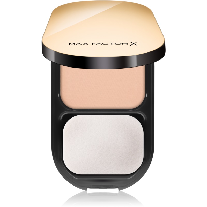 Max Factor Facefinity Compact Foundation in shade 006 Golden, featuring a sleek gold and black compact with a smooth powder and a white applicator sponge.
