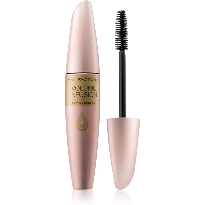 Max Factor Volume Infusion Mascara in a sleek pink tube with a gold label, featuring a black brush for application, designed to enhance lash volume with biotin and keratin.