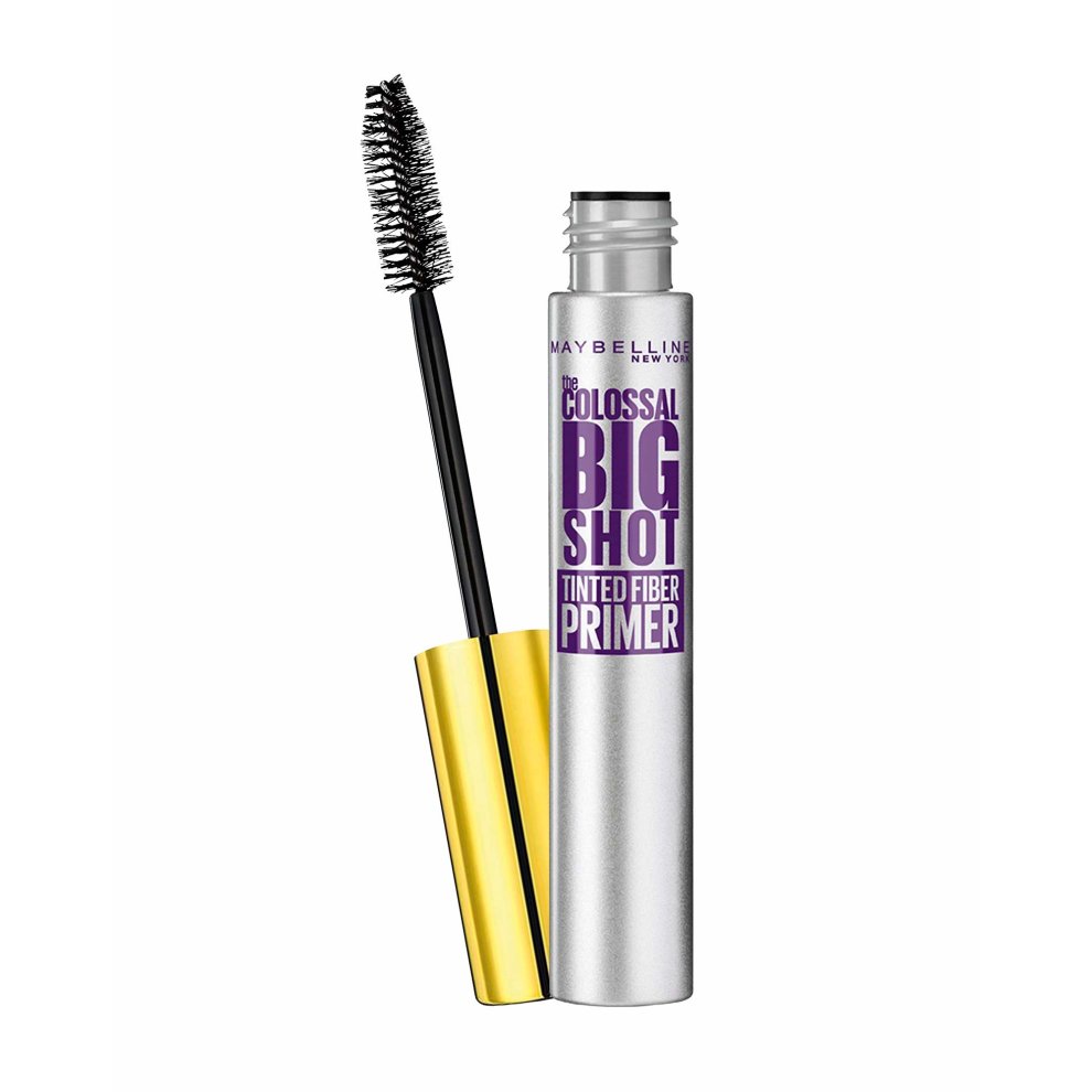 Black tinted fiber mascara in a sleek silver tube with a gold cap, featuring a thick brush applicator for voluminous lashes, labeled "Maybelline The Colossal Big Shot."