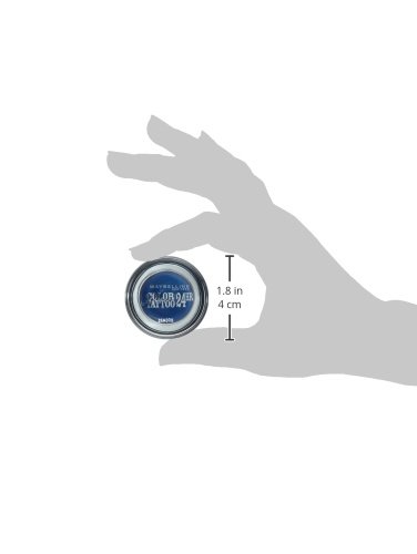 A hand holds a small round container of Maybelline Color Tattoo 24Hr Eyeshadow in shade 25 Everlasting Navy, featuring a deep navy blue color and a sleek, glossy finish.