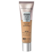 Maybelline Dream Urban Cover makeup in a beige tube with a silver cap, labeled "310 Warm Honey" and featuring SPF 50 for protective coverage.
