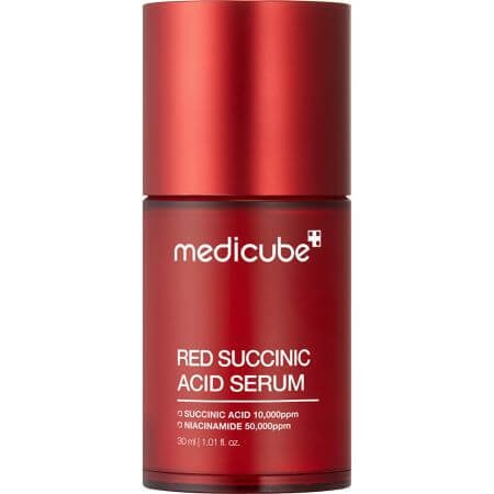 Red cylindrical bottle with a shiny finish, labeled "Medicube Red Succinic Acid Serum," featuring white text and a silver pump top, containing 30 ml of brightening serum.
