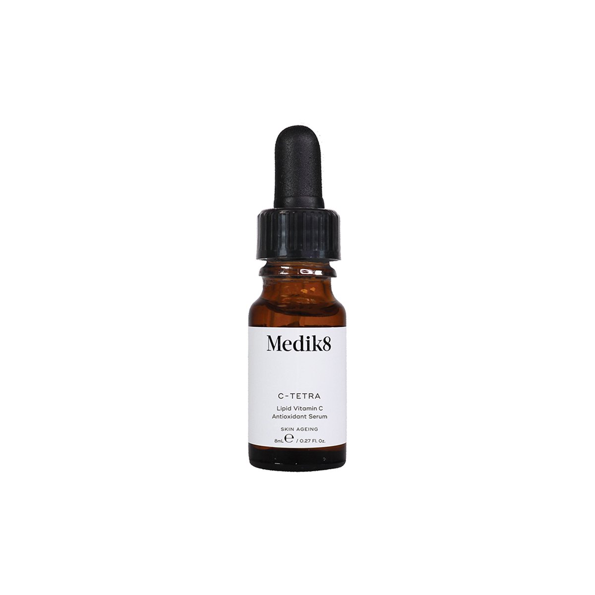 Brown glass dropper bottle with a black pipette cap, labeled "Medik8 C-Tetra Vitamin C Radiance Serum 8ml," featuring a white and black design.