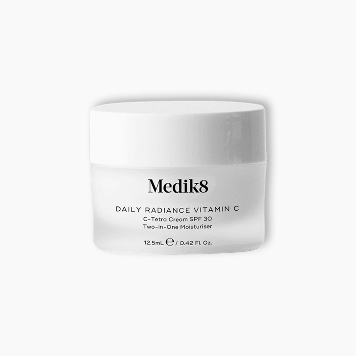 White jar with a smooth finish, labeled "Medik8 Daily Radiance Vitamin C," featuring a black font, containing 12.5ml of C-Tetra Cream SPF 30, designed for skin protection and hydration.
