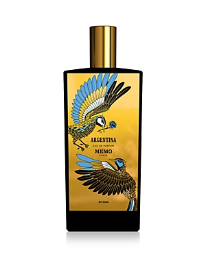 Clear glass bottle of Memo Paris Argentina Eau De Parfum, featuring vibrant blue and gold bird illustrations on a gold background, with a sleek black cap.