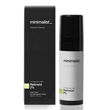 Yellow 30ml face cream bottle with a sleek black pump top and minimalist design, accompanied by a matching black box labeled "Granactive Retinoid 02%."