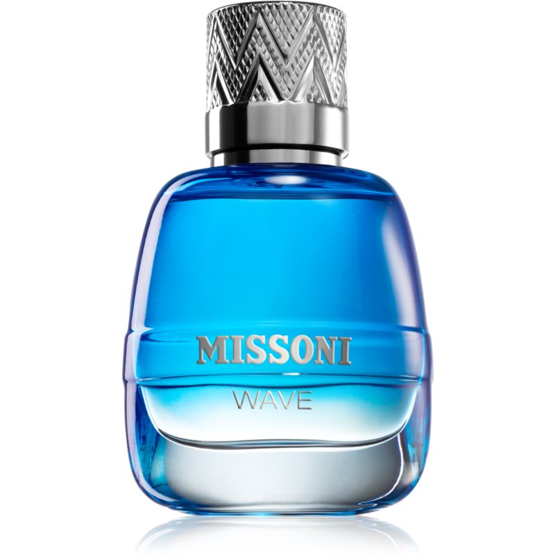 Clear glass bottle with a blue gradient, featuring a textured silver cap and "MISSONI WAVE" embossed on the front, containing 50ml of Eau De Toilette.