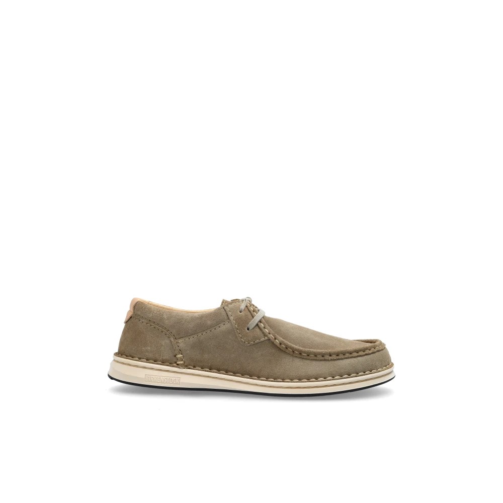 Gray leather Birkenstock oxfords with a low profile, featuring a round toe, stitched detailing, and a light-colored sole, sized EU40/US7.
