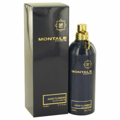 Montale Aoud Flowers Eau De Parfum in a sleek, dark blue bottle with a gold cap, displayed alongside its elegant black box featuring gold lettering.