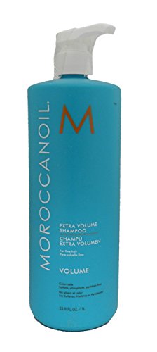 Turquoise plastic bottle of Moroccanoil Extra Volume Shampoo, featuring a white pump top, orange "M" logo, and product details in white text, containing 1000ml.