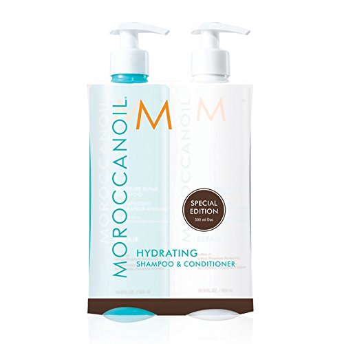 Two 500ml bottles of Moroccanoil Hydrating Shampoo and Conditioner, featuring a light blue shampoo bottle with a pump and a white conditioner bottle, both labeled with the Moroccanoil logo.