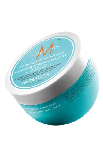 Turquoise round container with a white lid, labeled "Moroccanoil Hydrating Mask Light 250ml," featuring a sleek design and the brand logo prominently displayed.