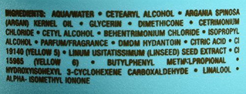Moroccanoil Intense Hydrating Mask in a turquoise container with a silver lid, featuring detailed ingredient list and branding prominently displayed.