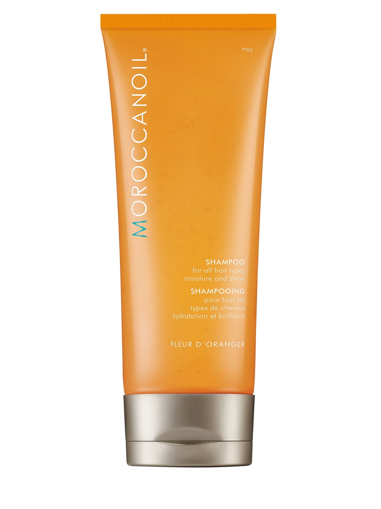 Bright orange tube of Moroccanoil Fleur D'orange Shampoo, 200ml, featuring a silver cap and bold white text, designed for all hair types, promoting moisture and shine.