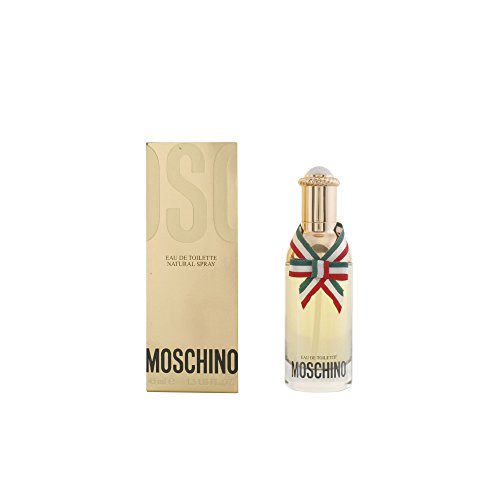 Gold box with "MOSCHINO" in bold black letters next to a clear glass bottle featuring a decorative ribbon and a round, gem-like cap, containing a light yellow fragrance.