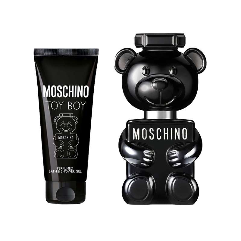 Black bear-shaped bottle of Moschino Toy Boy EDP alongside a black tube of bath and shower gel, both featuring playful branding and a sleek design.