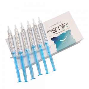 Six transparent syringes filled with light blue teeth whitening gel, placed beside a white box labeled "mysmile Teeth Whitening Gel" featuring a smile graphic.