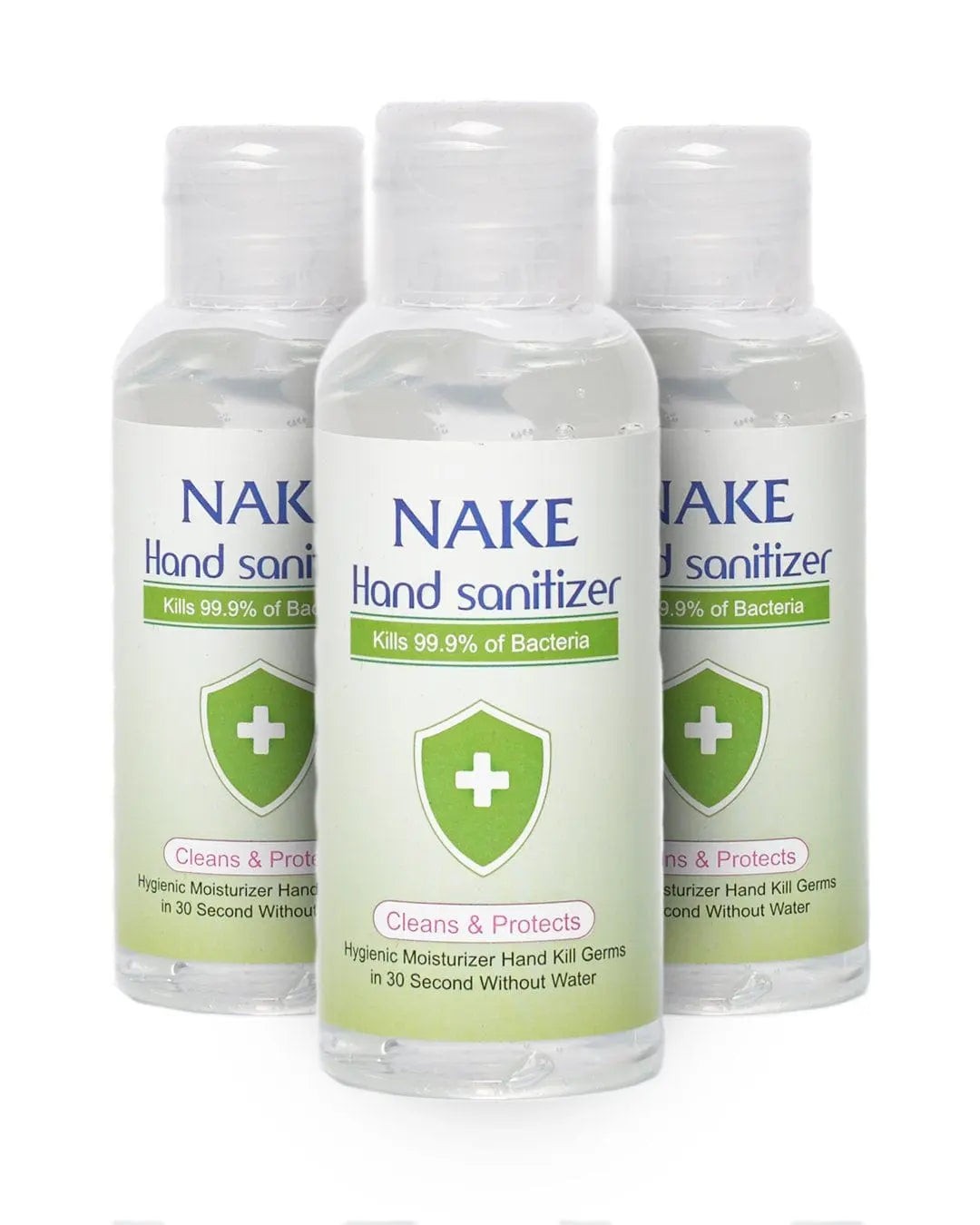 Three transparent plastic bottles of Nake Hand Sanitiser, each 100 ml, featuring a green label with a white cross, stating "Kills 99.9% of Bacteria" and "Cleans & Protects."