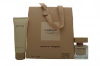Narciso Rodriguez Narciso Poudree gift set featuring a 30ml EDP in a clear glass bottle, a 75ml body lotion in a beige tube, and a matching beige gift bag.